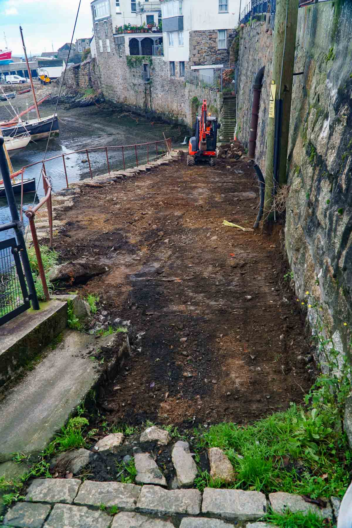 Scraping down the topsoil on the Red Lion slip