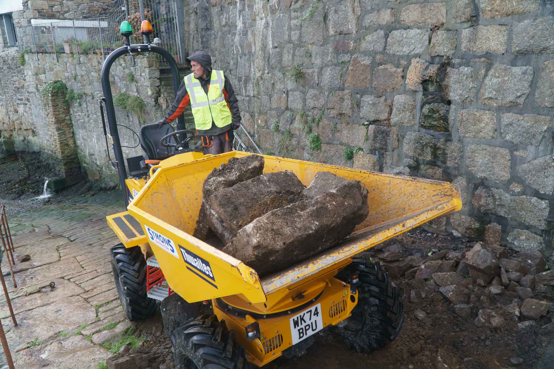 Huge granite stones from the old adit channel