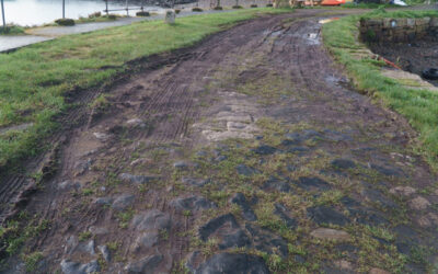 Scraping back the old quay surface